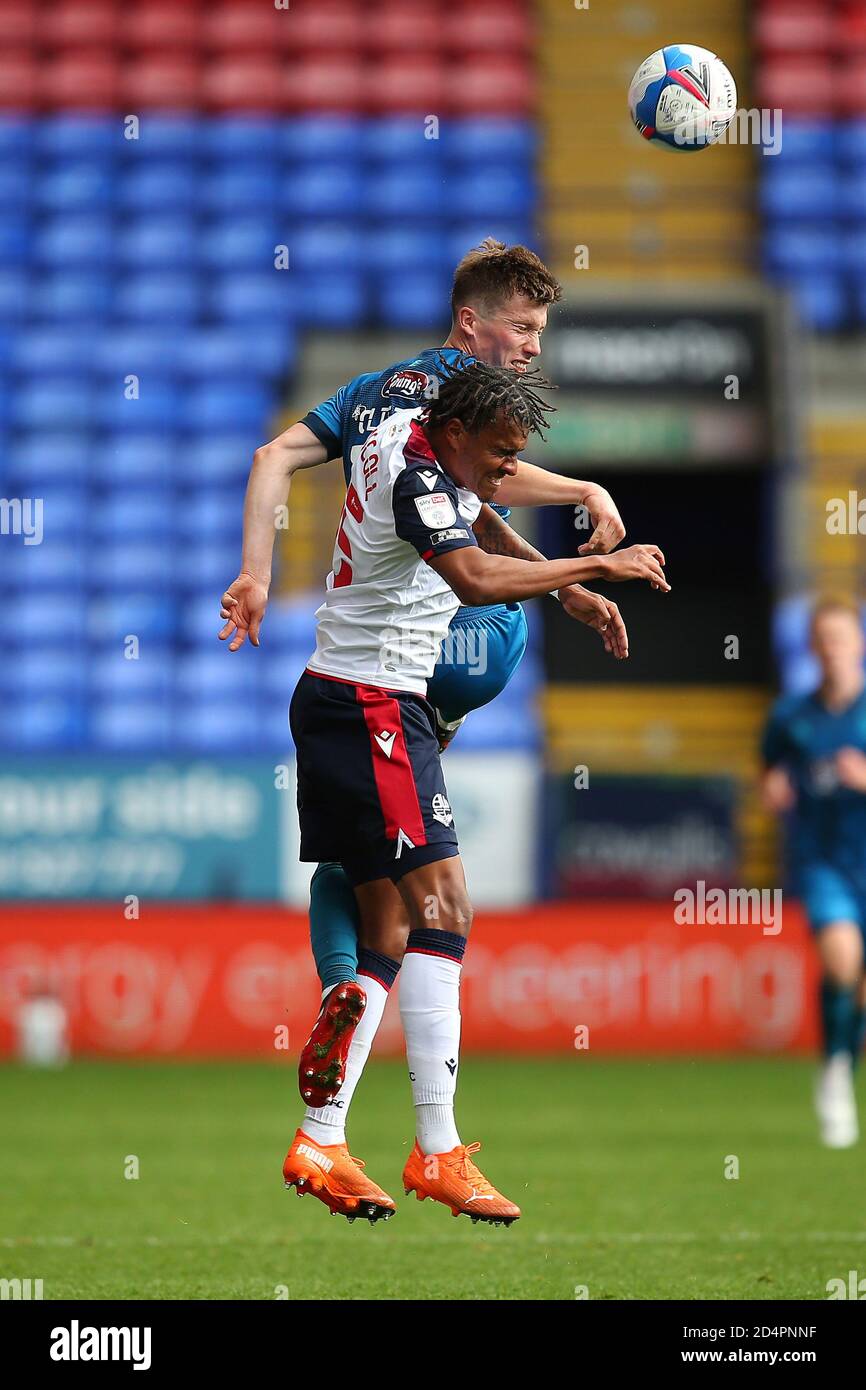 Boltons Jamie Mascoll battles with Grimsbys Harry Clifton during the Sky Bet League 2 match between Bolton Wanderers and Grimsby Town at the Reebok Stadium, Bolton on Saturday 10th October 2020. (Credit: Chris Donnelly | MI News) Credit: MI News & Sport /Alamy Live News Stock Photo