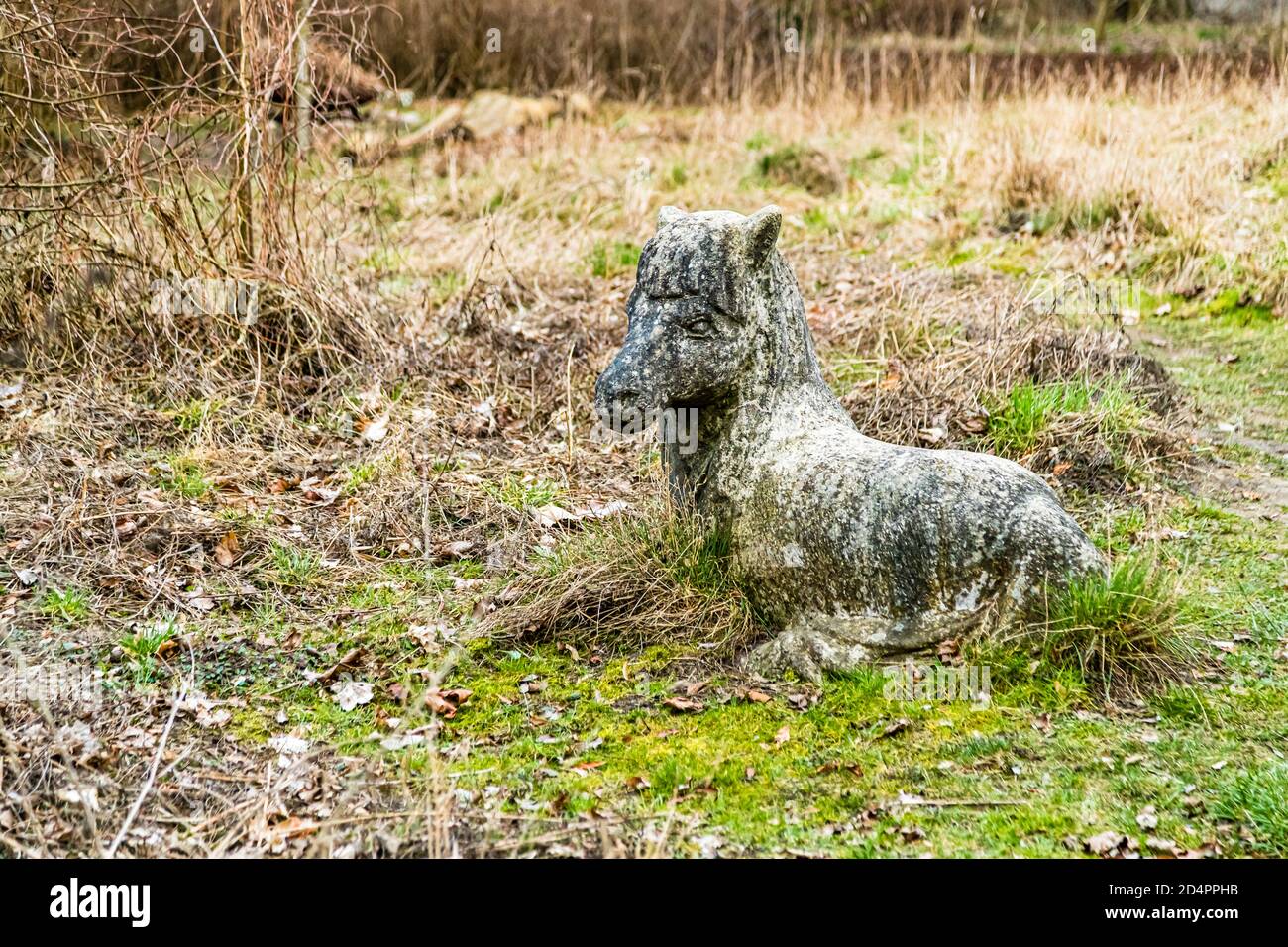 Weathered fairy tale animal figure made of concrete in Röbel-Müritz, Germany Stock Photo