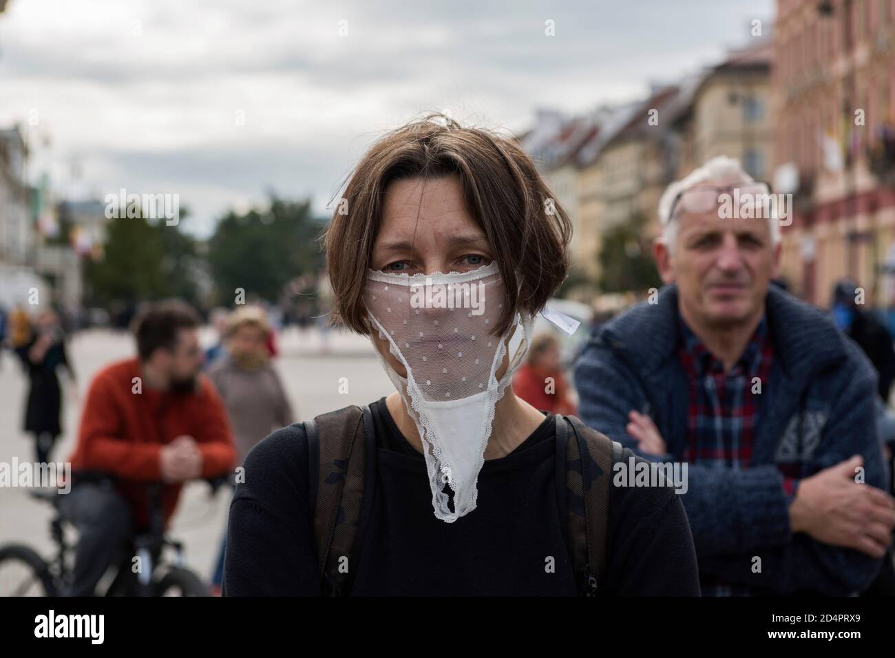 A woman wearing a panty on her face as a parody of the protective masks  during the protest. Opponents of restrictions imposed by the government in  connection with the spread of the