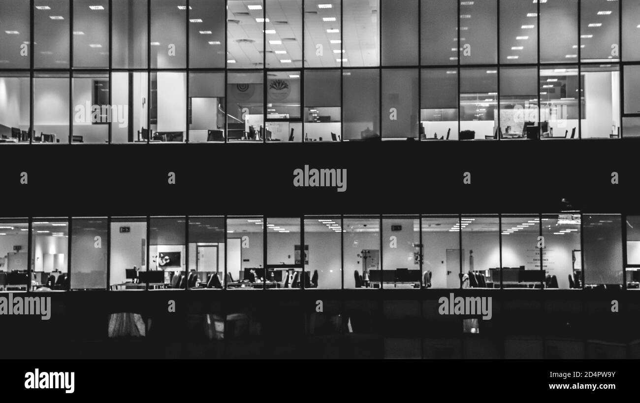 Office building with transparent windows, work place, black and white ...