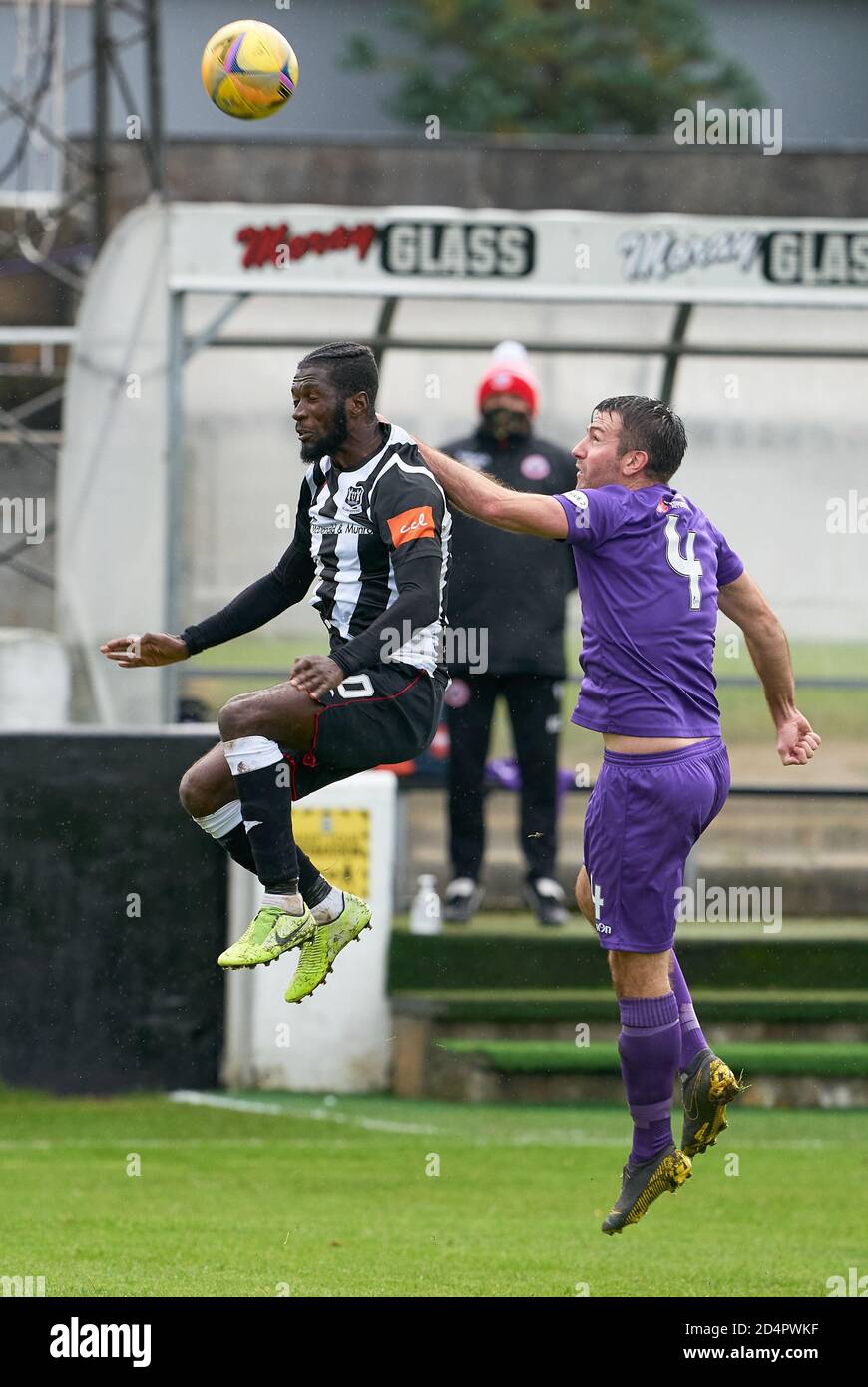 Elgin City FC, Borough Briggs, Elgin, Moray, UK. 10th Oct, 2020. UK. This is from the Betfred Cup Football Match between Elgin City and Stirling Albion. PICTURE CONTENT:- L - 10 - Elgin - Smart Osadolor and R - 4 Stirling - Paul MacLean Credit: JASPERIMAGE/Alamy Live News Stock Photo