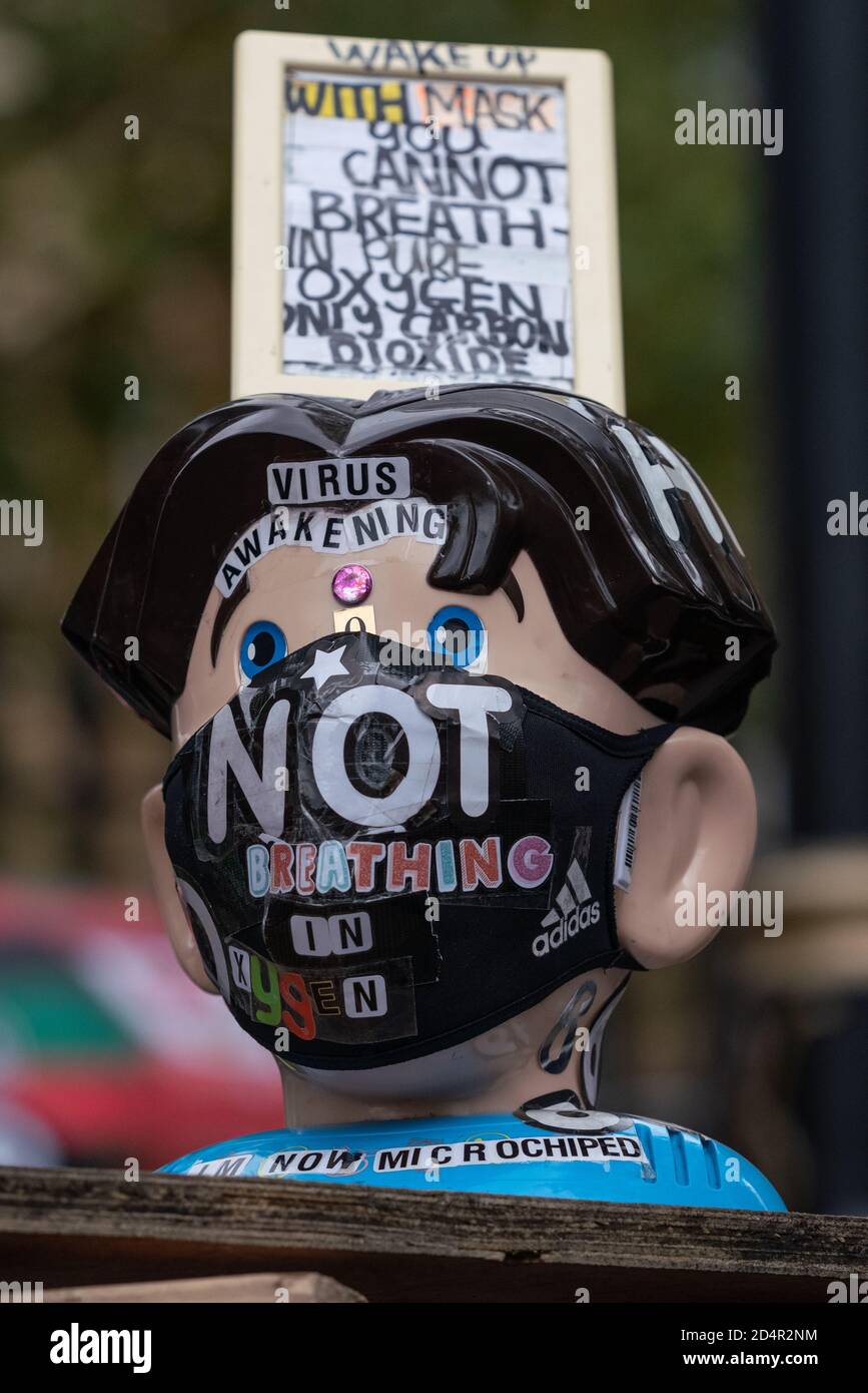 London, UK. 10th October, 2020. Anti-covid19 protesters rally opposite Downing Street under a heavy police presence as part of on-going demonstrations against the current government imposed Coronavirus restrictions. The conspiracy theorists continue to claim the pandemic is an orchestrated hoax and demand no further lockdown regulations, no social distancing, no masks, no track and trace, no health passports, no mandatory vaccinations and no 'new normal'. Credit: Guy Corbishley/Alamy Live News Stock Photo