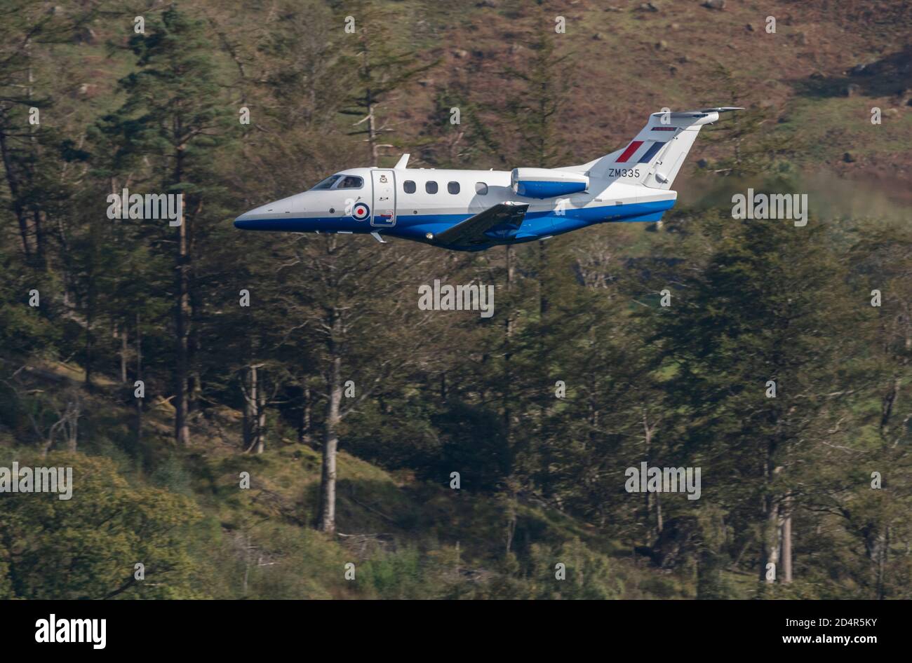 RAF Phenom ZM335, Low Level flying at Thirlmere in the lake District, LFA17 Stock Photo