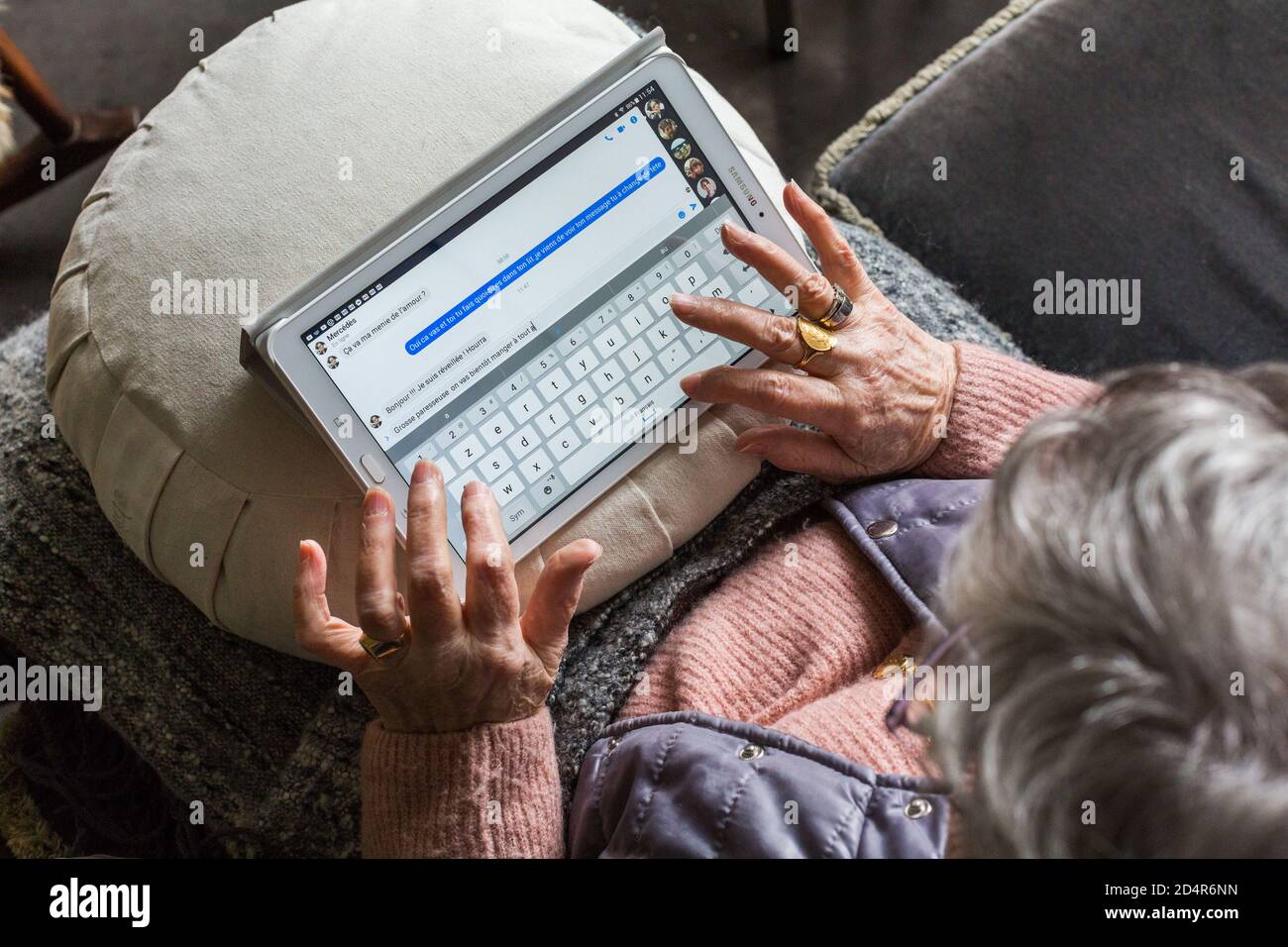 Woman using a digital tablet. Stock Photo