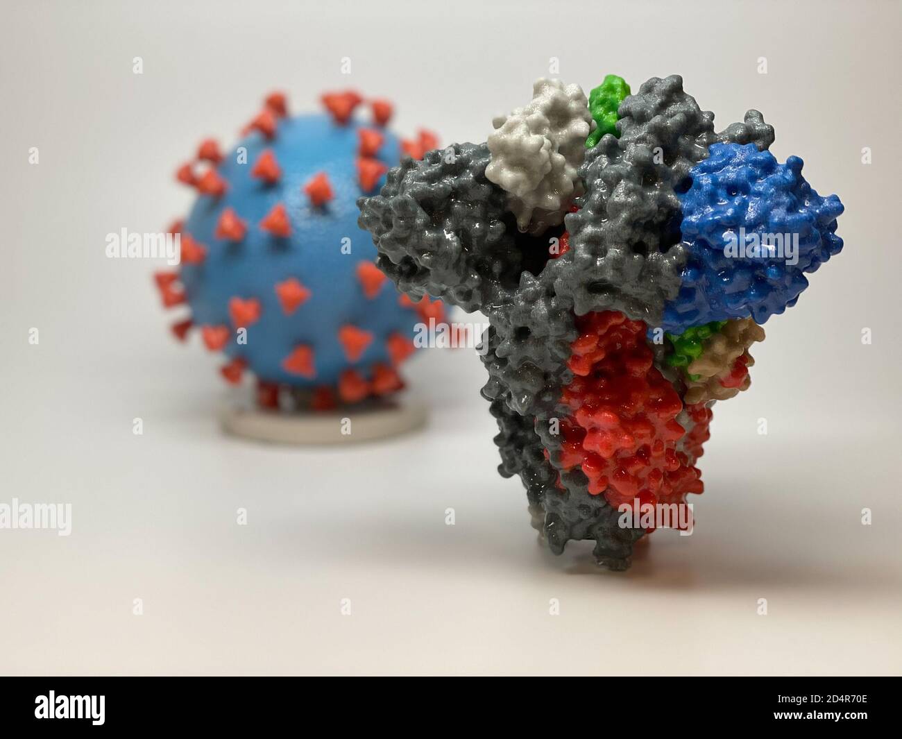 3D print of a spike protein on the surface of SARS-CoV-2—also known as 2019-nCoV, the virus that causes COVID-19, spike proteins cover the surface of Stock Photo