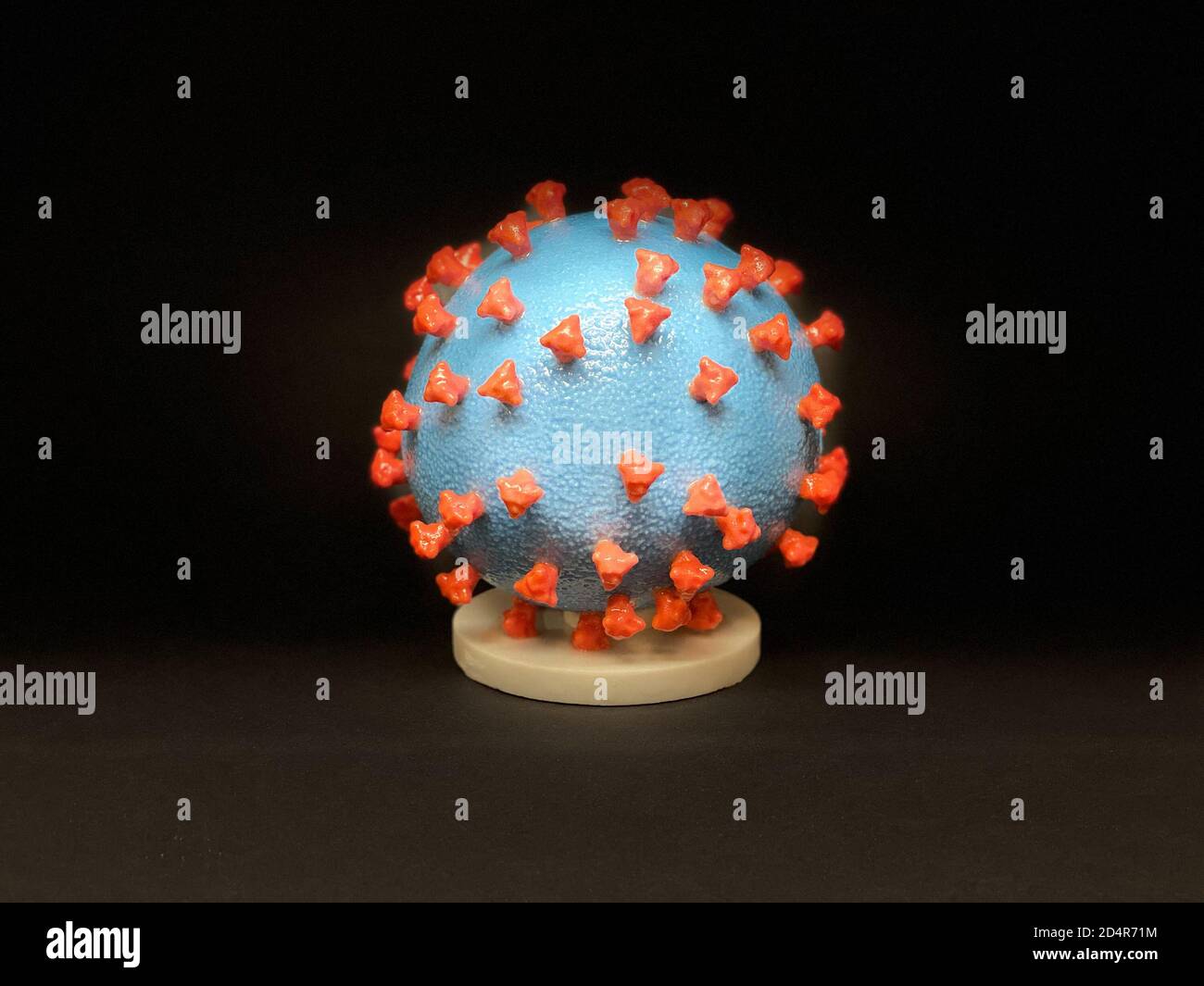 3D print of a spike protein on the surface of SARS-CoV-2—also known as 2019-nCoV, the virus that causes COVID-19, spike proteins cover the surface of Stock Photo