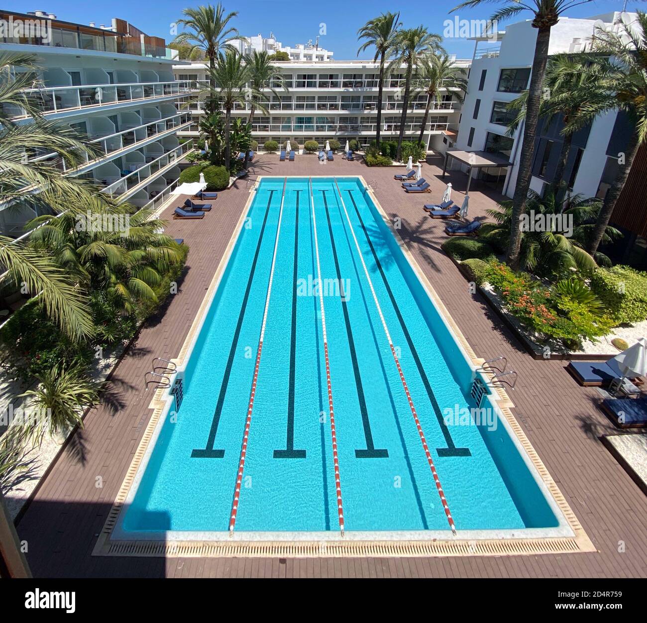 Alcudia, Spain. 12th July, 2020. The swimming pool of the Suites Hotel Las Gaviotas. Alcudia and the beach Playa del Muro is located in the north of the holiday island. Credit: Soeren Stache/dpa-Zentralbild/ZB/dpa/Alamy Live News Stock Photo