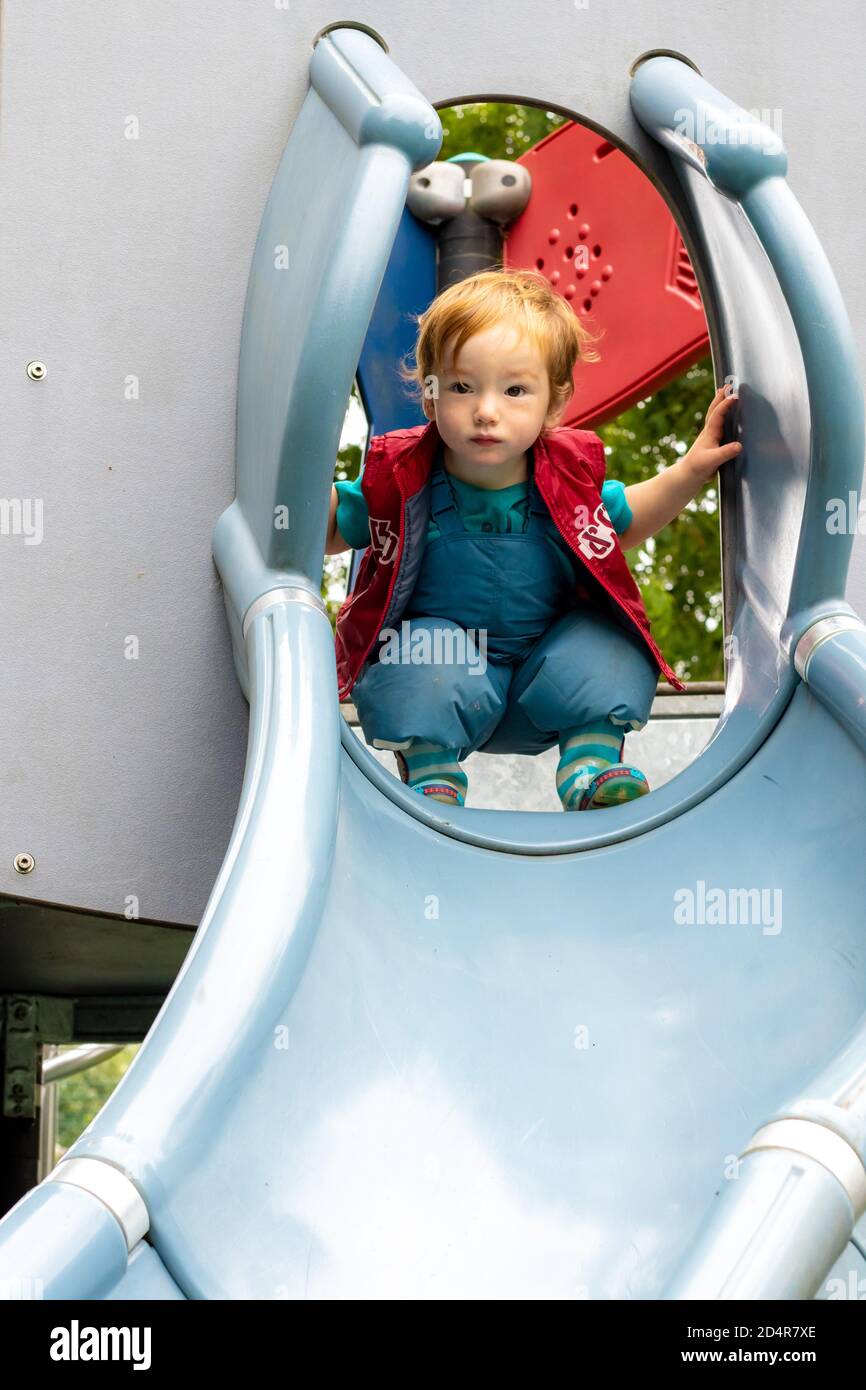 Active Boy Sliding Down Stock Photo - Download Image Now - Slide - Play  Equipment, Sliding, Child - iStock
