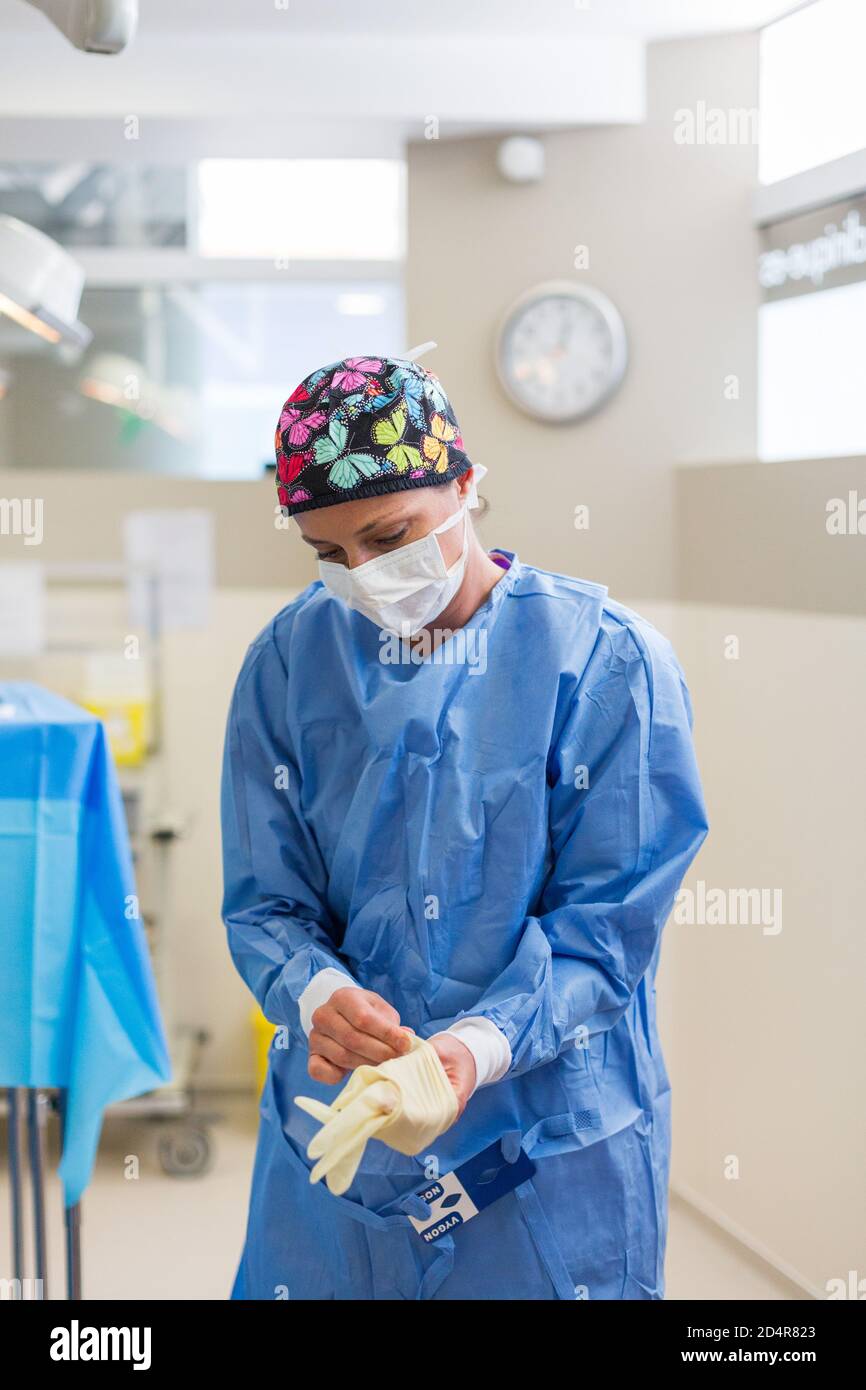 Surgical team getting dressed before surgery, Aesthetic private hospital of Aquitaine, Bordeaux, France. Stock Photo