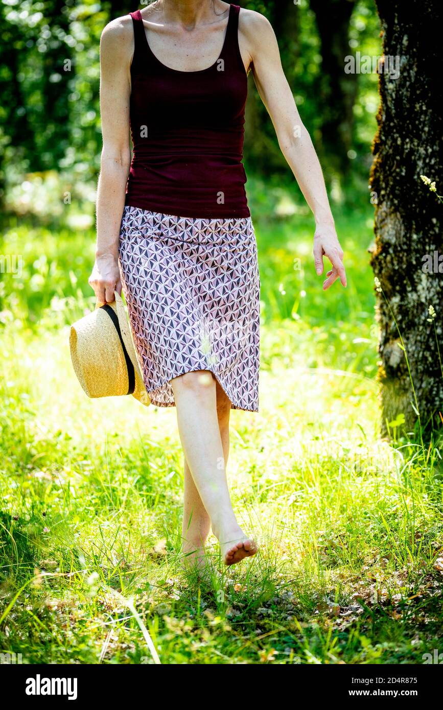 Barefoot woman walking in forest hi-res stock photography and images ...