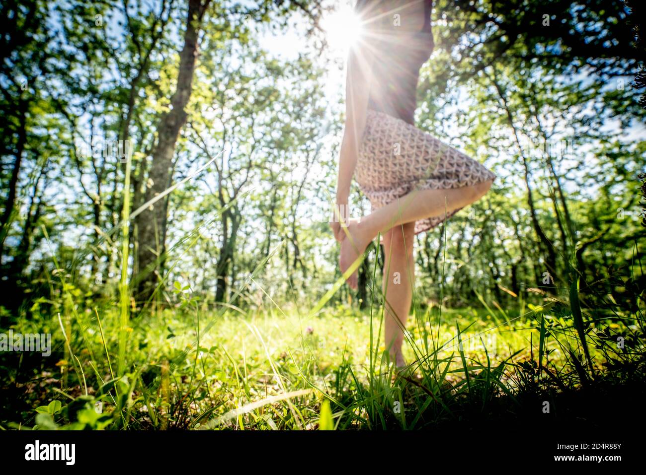 Woman walking barefoot grass garden hi-res stock photography and images ...