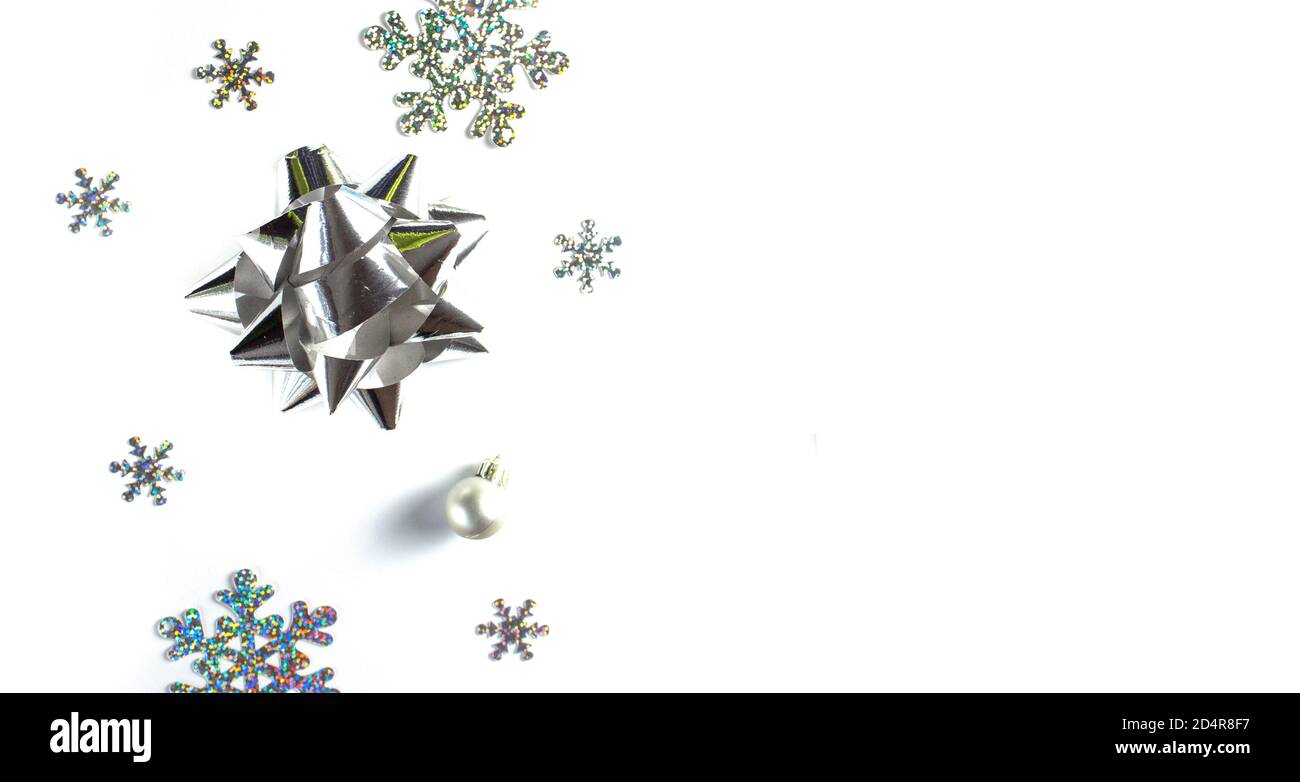 Flatley Christmas. Christmas or New Year composition with silver decorations on a white background. copyspace Stock Photo