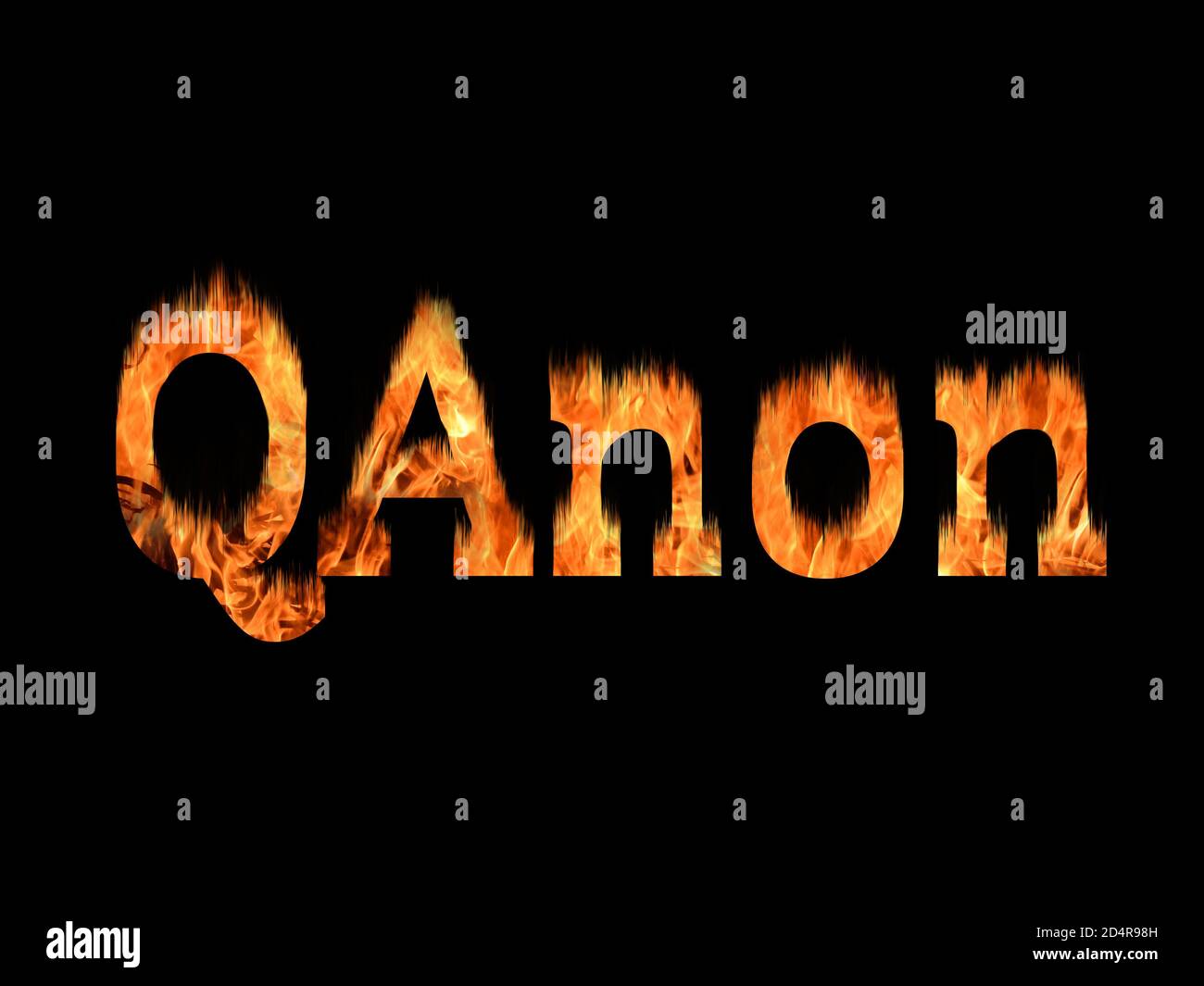 QAnon or Q Anon deep state conspiracy theory text on fire over black background Stock Photo