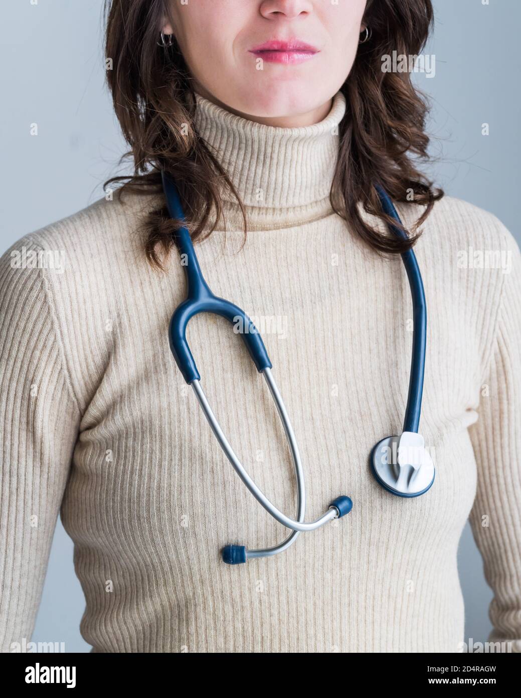 Young woman with a stethoscope. Stock Photo