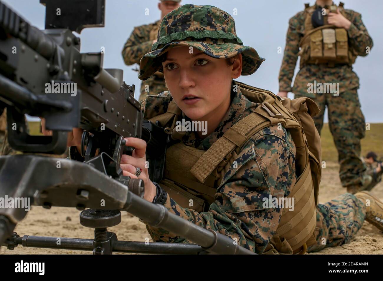 U.S. Marine Corps PFC Jasmine Strait, a Field Radio Operator with Headquarters Company, 6th Marine Regiment, 2nd Marine Division, practices clearing procedures on an M240B Machine Gun during a basic skills training range at Camp Geiger, North Carolina, December 17, 2019. The training ensures that every Marine in the regiment is capable of completing the mission regardless of occupation. (U.S. Marine Corps photo by Lance Cpl. Brian Bolin Jr.) Stock Photo