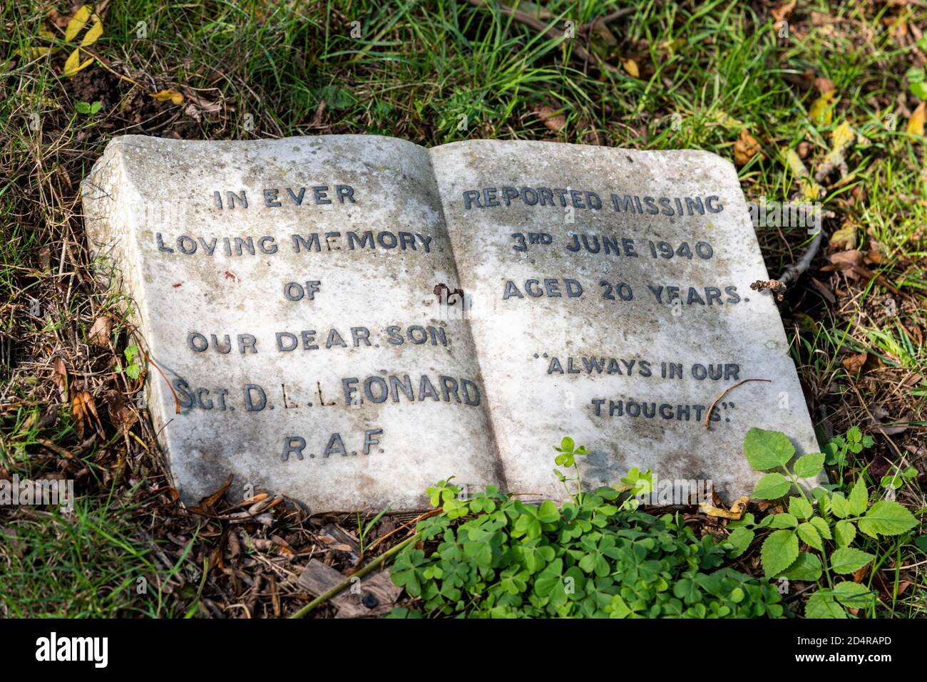 Stone in the form of a book in memory of Sergeant DL Leonard, RAF, reported missing 3 June 1940, aged 20. Battle P2269 shot down by anti-aircraft fire Stock Photo