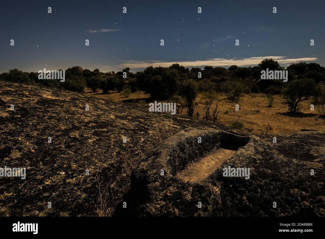 Night landscape with ancient grave in the Barruecos Natural Area. Spain. Stock Photo
