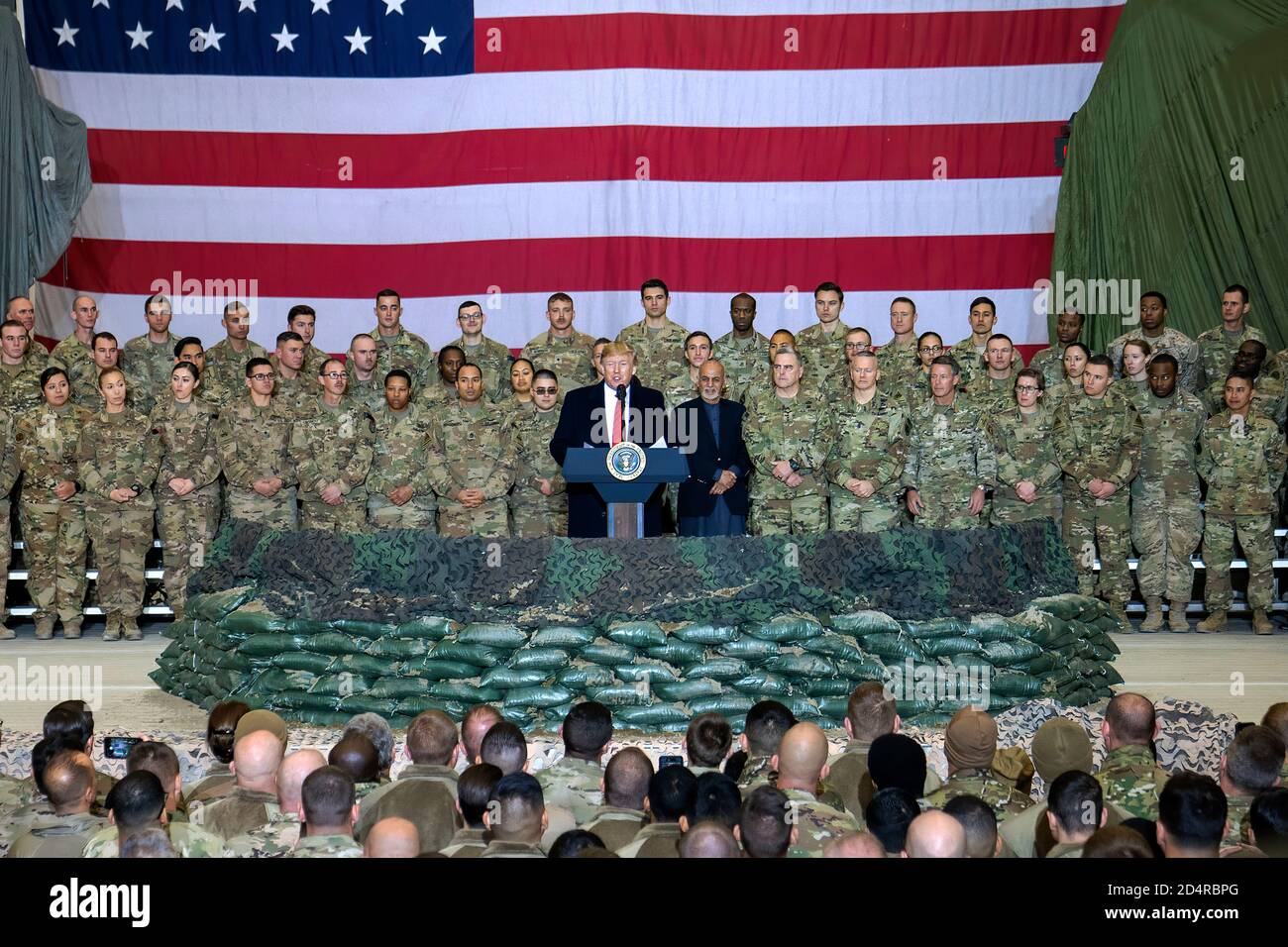 President of the United States Donald J. Trump and Army Gen. Mark A. Milley, chairman of the Joint Chiefs of Staff, meet with service members at Bagram Airfield in Afghanistan, Nov. 28, 2019. (DOD photo by U.S. Navy Petty Officer 1st Class Dominique A. Pineiro) Stock Photo