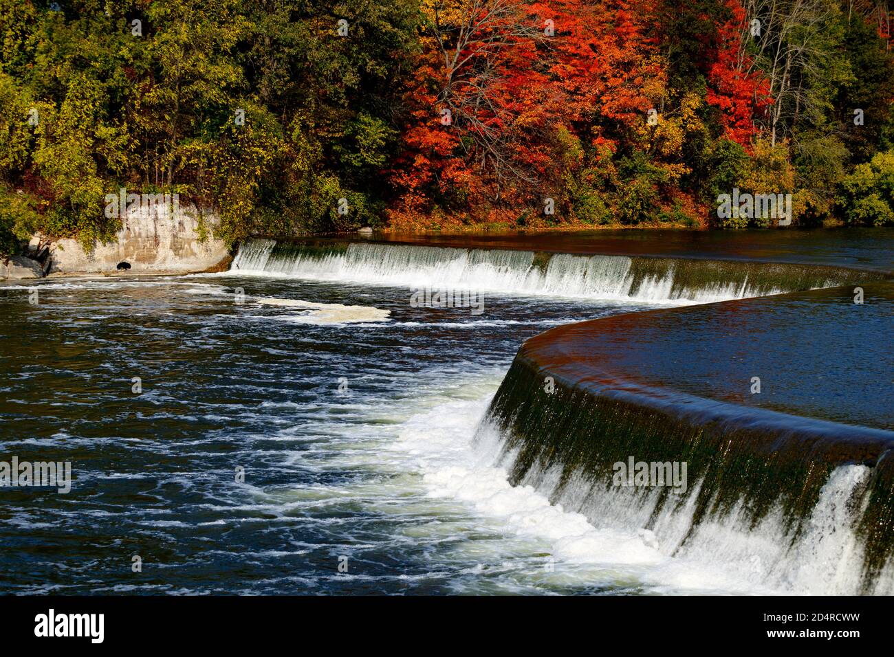 Penmans Dam in Fall colors on the Grand River. Paris Ontario Canada
