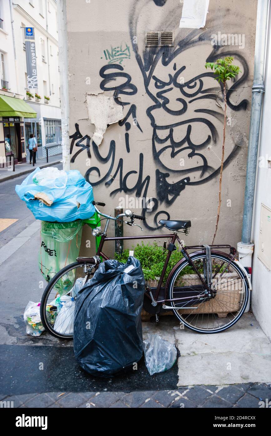 Garbage in a street of Paris, France Stock Photo Alamy