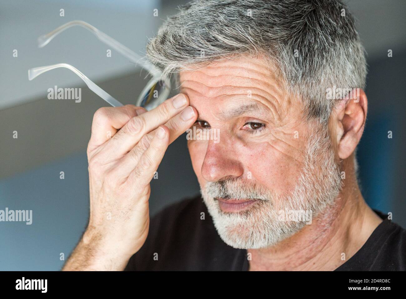 Man suffering from headache. Stock Photo