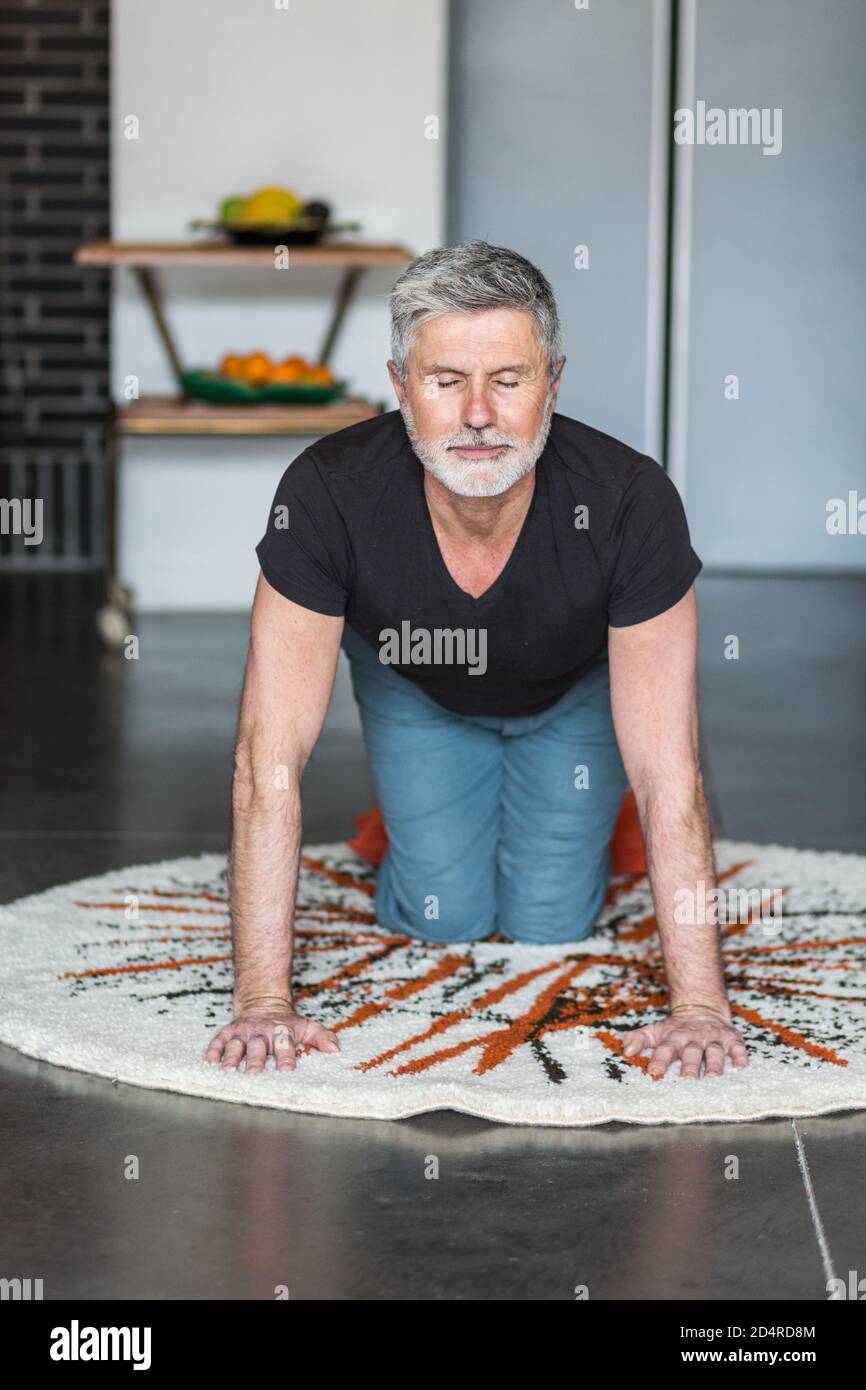 Man practicing yoga. Stock Photo