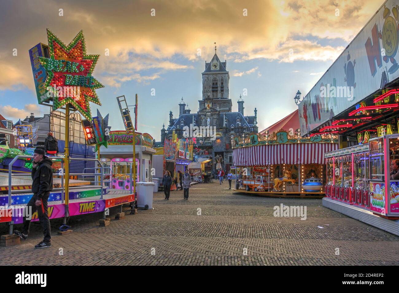 Funfair in Market Square (Markt) in Delft, The Netherlands with the City Hall in the background. Stock Photo