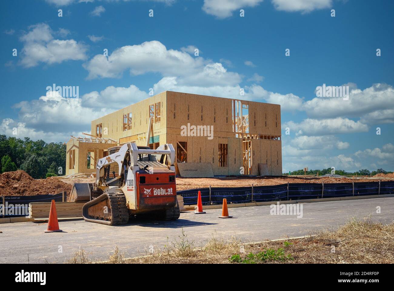 Residential Construction with Bobcat Stock Photo