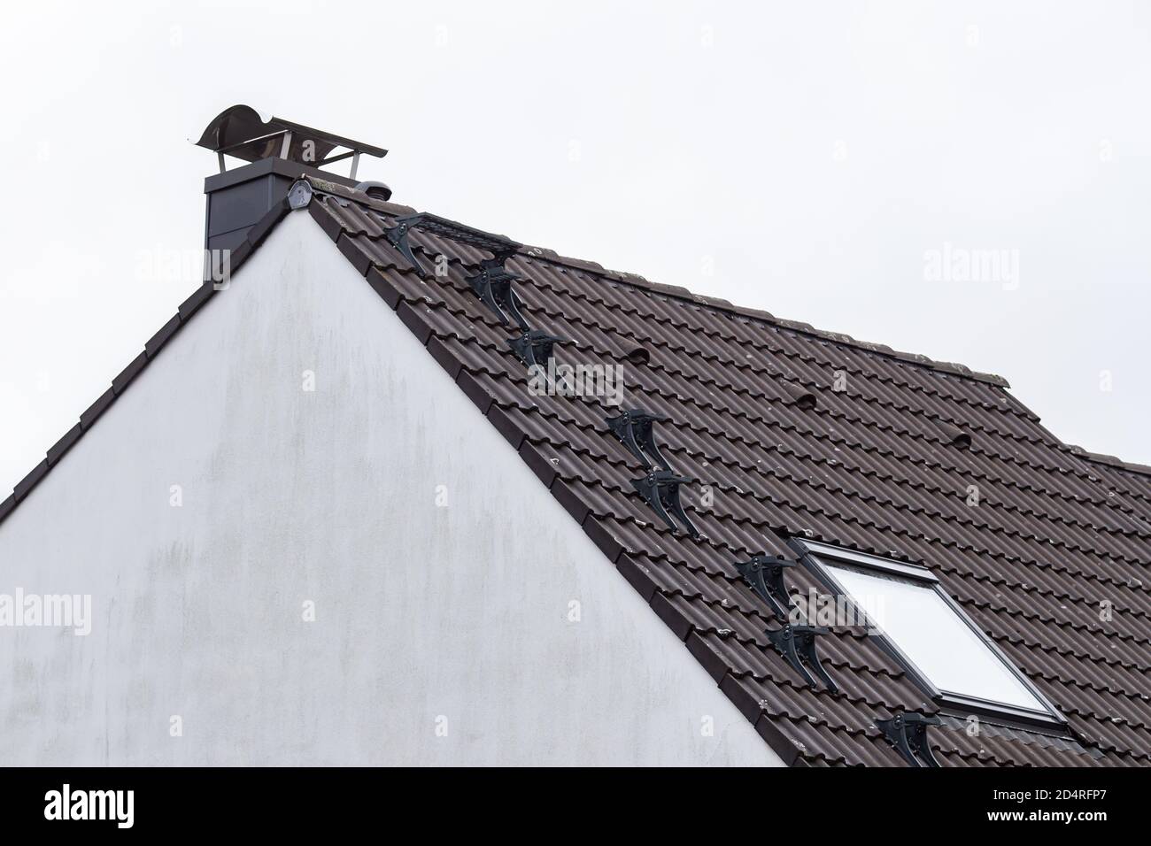 Closeup shot of a tiled roof of a modern house building Stock Photo