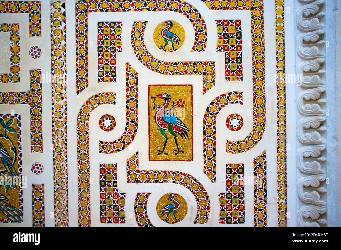 Brightly colored mosaic featuring a bird of paradise, on the Ambo of the Epistles (early reading stand) in the Duomo di Ravello, Amalfi Coast. Stock Photo