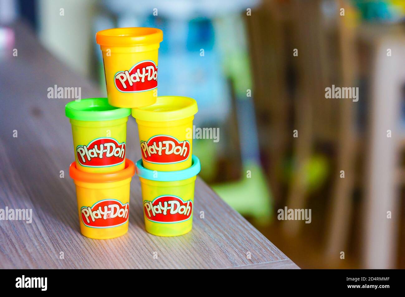 POZNAN, POLAND - Mar 08, 2016: Mix of colorful Play Doh clay in containers  on a table Stock Photo - Alamy