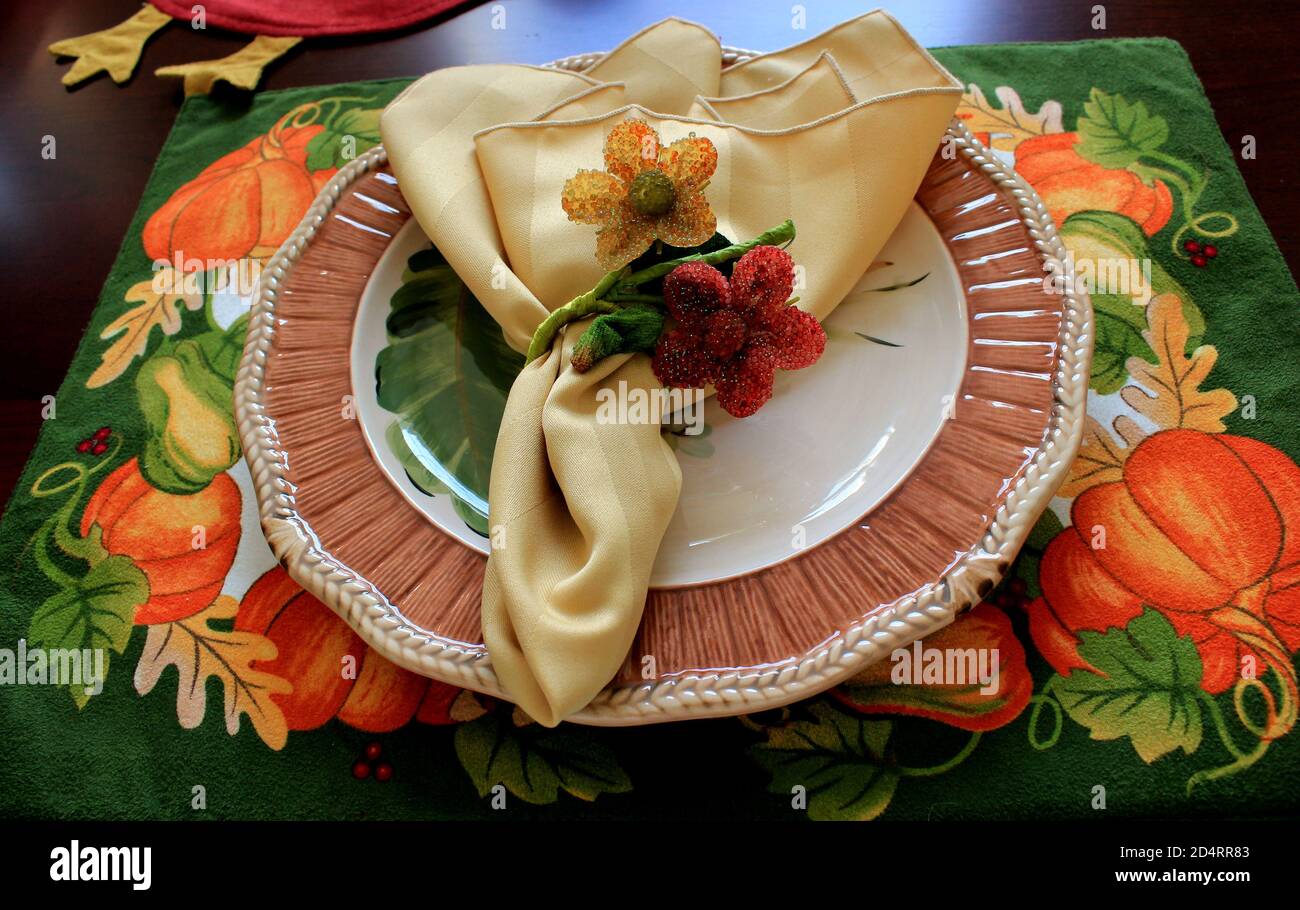 Autumn tablesetting with plate, napkin and placemat Stock Photo