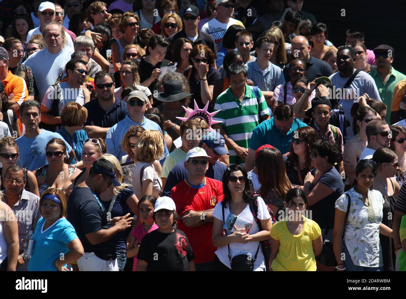 People waiting in front of the statue of liberty, New York Stock Photo ...