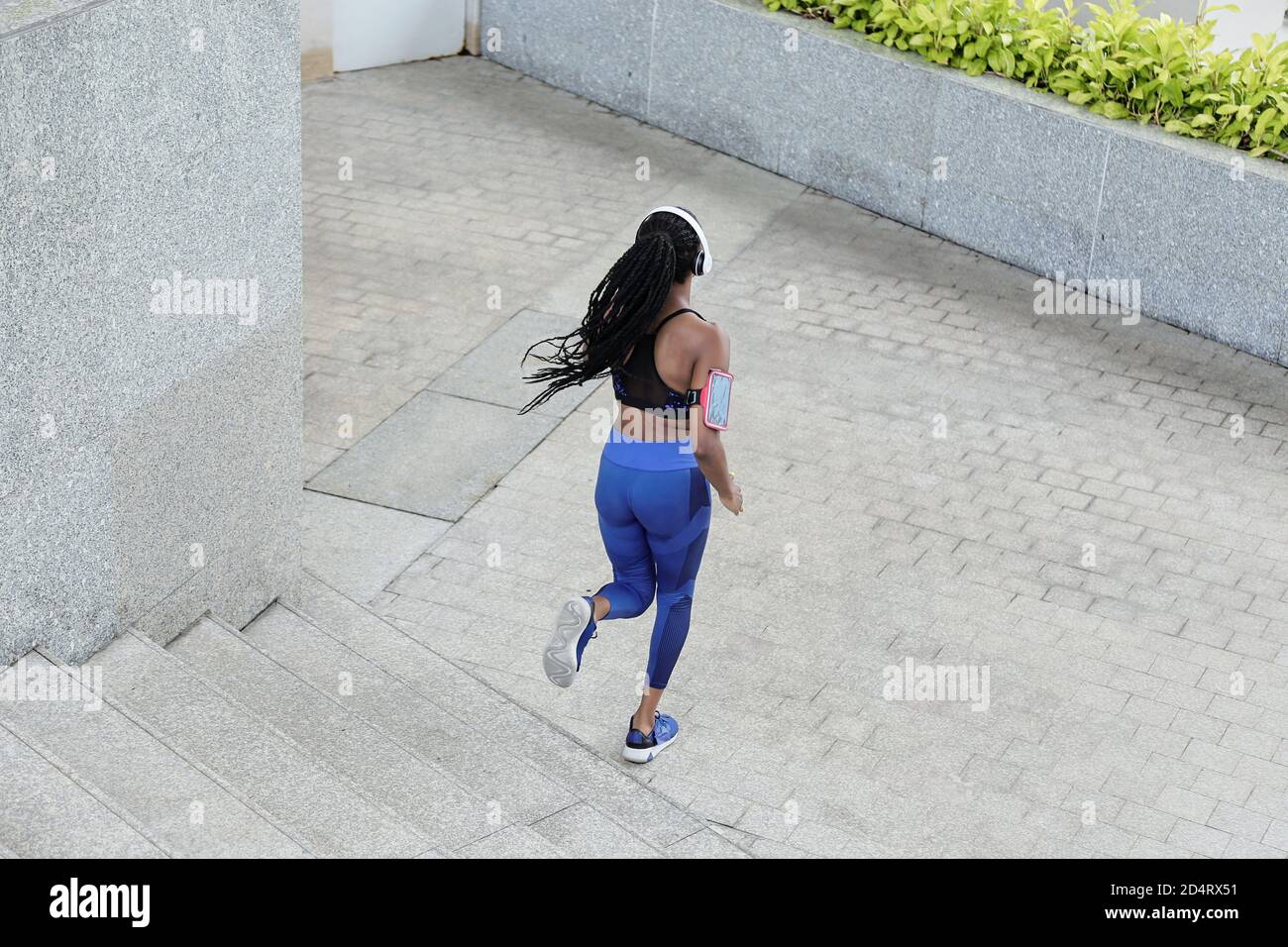 Fit woman running Stock Photo