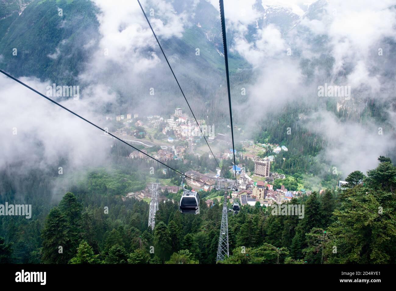 cable car on a mountain slope cable cars running up and down Stock Photo