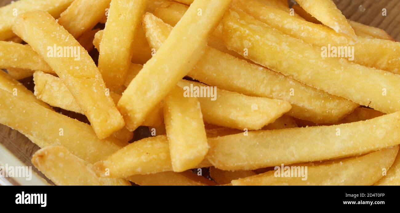 fresh crispy french fries from the deep fryer Stock Photo Alamy