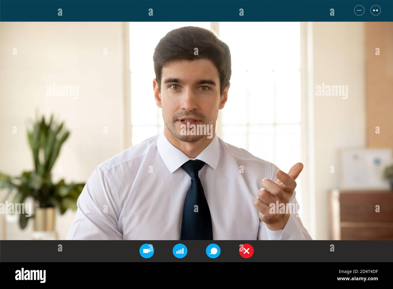 Screen view of male employee speak on video call Stock Photo - Alamy