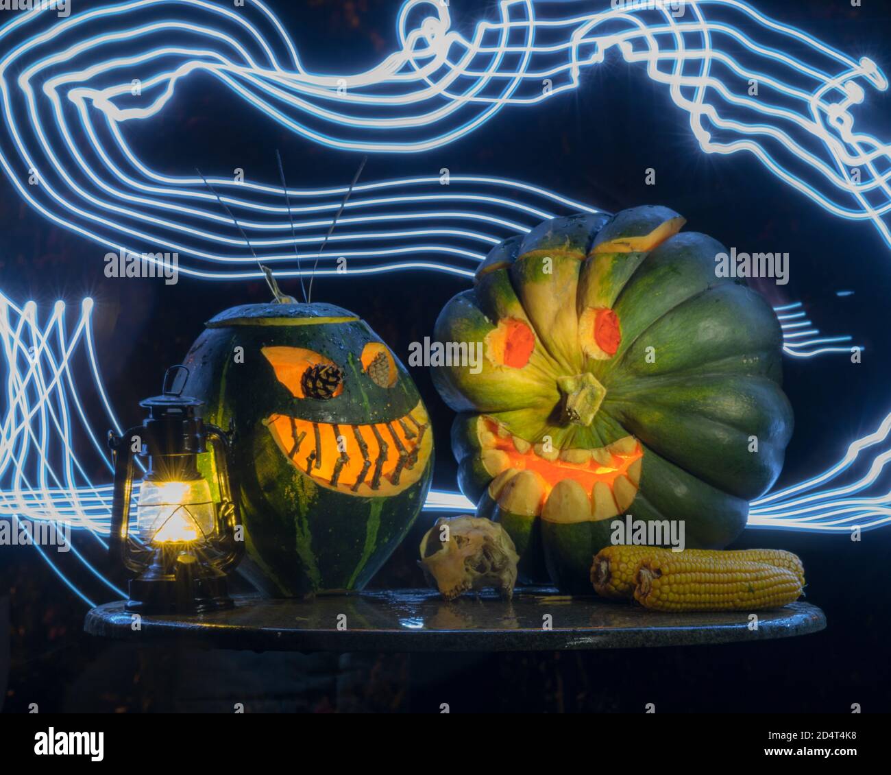 Halloween pumpkin head jack lantern with burning candles in a scary ...