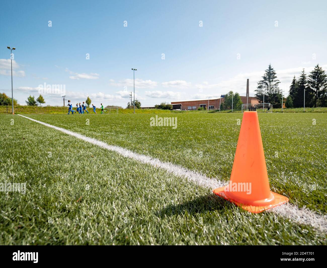 Orange border cone. Soccer training court line and cone equipment on