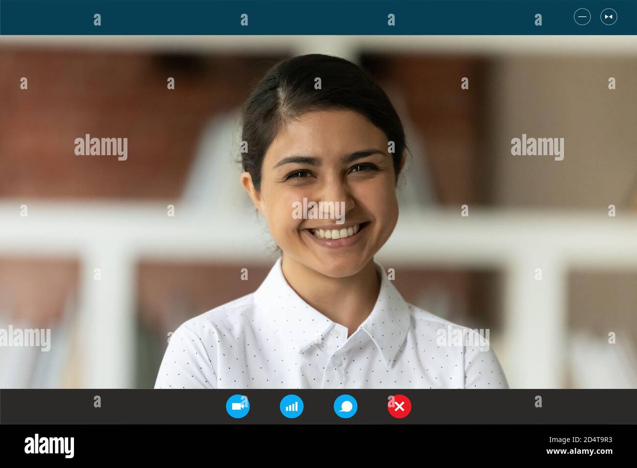 Smiling Indian woman talk on video call at home Stock Photo - Alamy