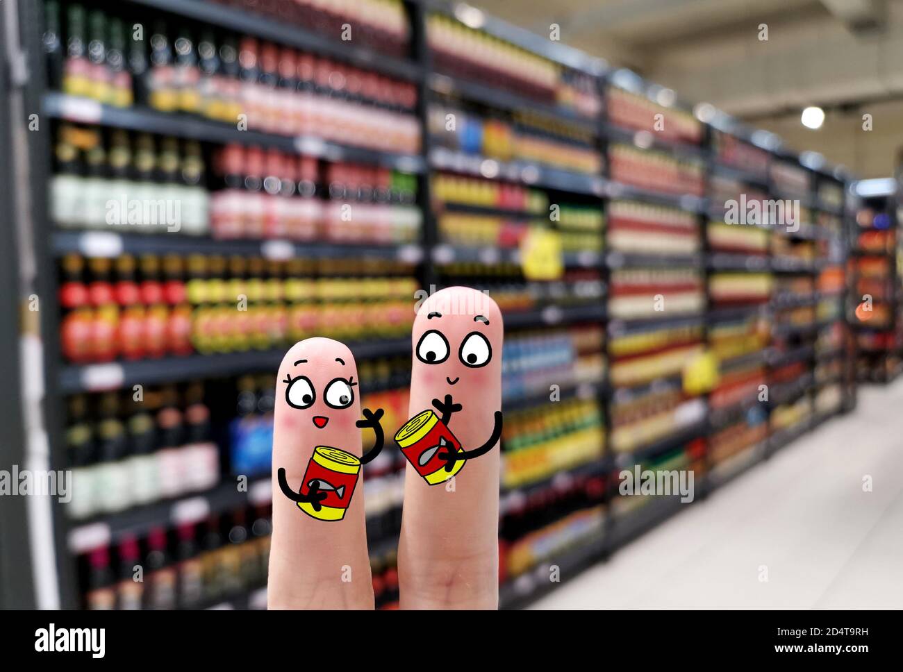 Two fingers are decorated as two person. They are checking expiry date