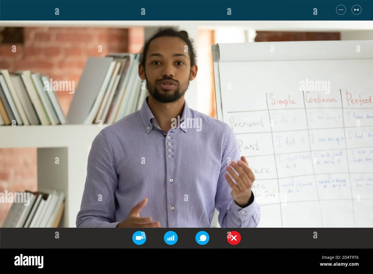 Screen view of ethnic male teacher speak on video call Stock Photo - Alamy