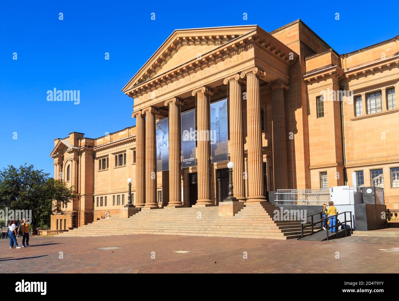 The State Library of New South Wales in Sydney, Australia. The entrance to the Mitchell Wing (1910), a sandstone building with towering columns Stock Photo