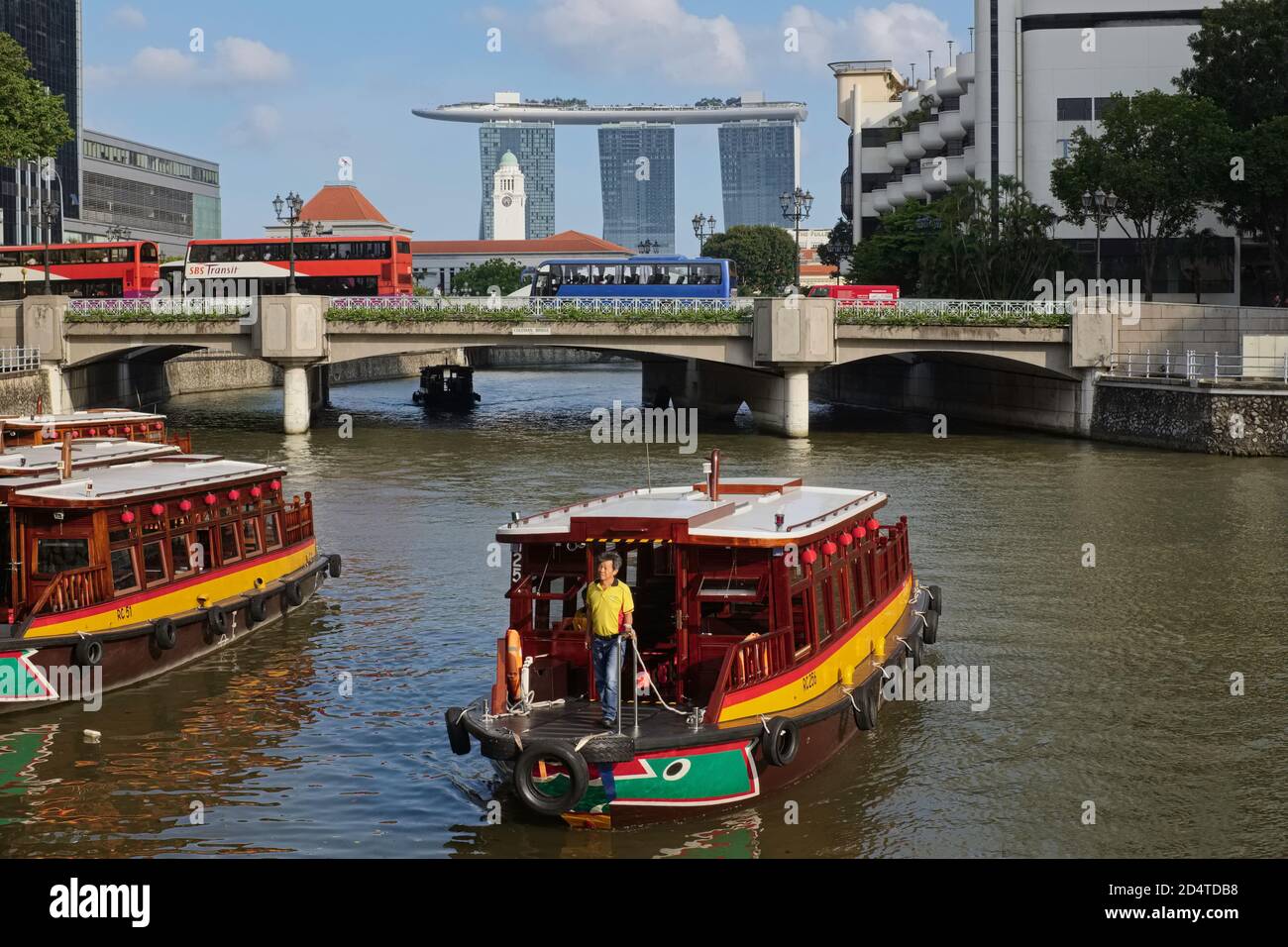 A tour boat at Clarke Quay by the Singapore River, Singapore; b/g the