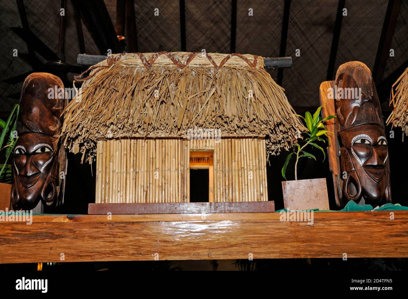 A model of thatched roof Fijian Bure ( old traditional houses) and a cold food buffet at the Outriggers Fji Beach Resort near Sigatoka on the island o Stock Photo