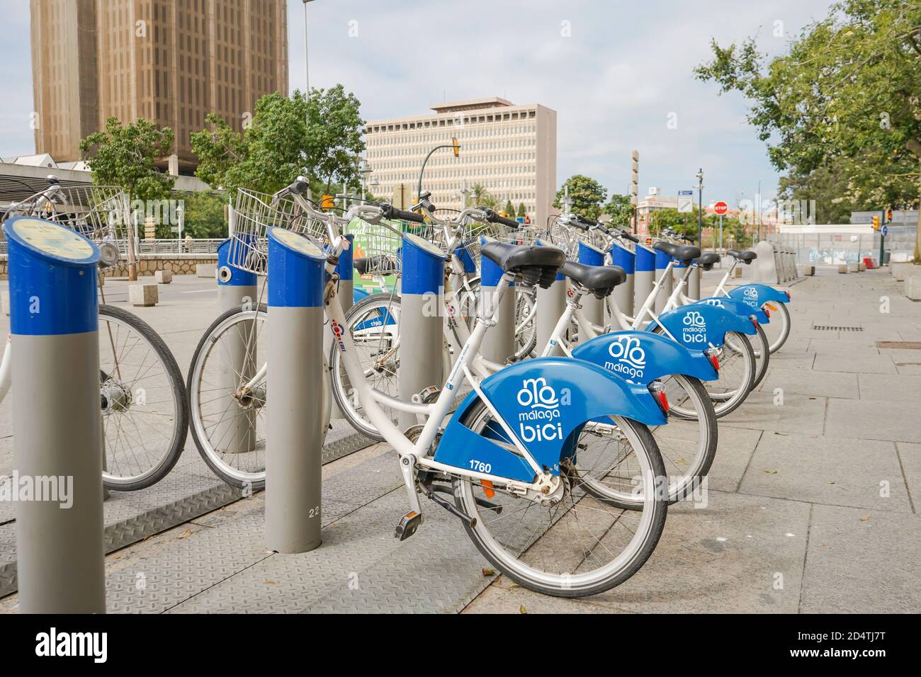 Malaga spain, Row of blue Malaga Bici, public bicycles renting system station in Malaga, Andalusia, Spain. Stock Photo