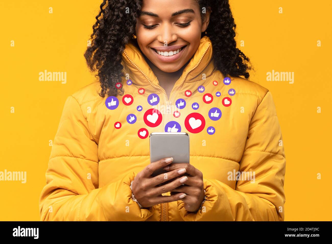 Happy Black Woman Holding Smartphone With Like Buttons, Yellow ...