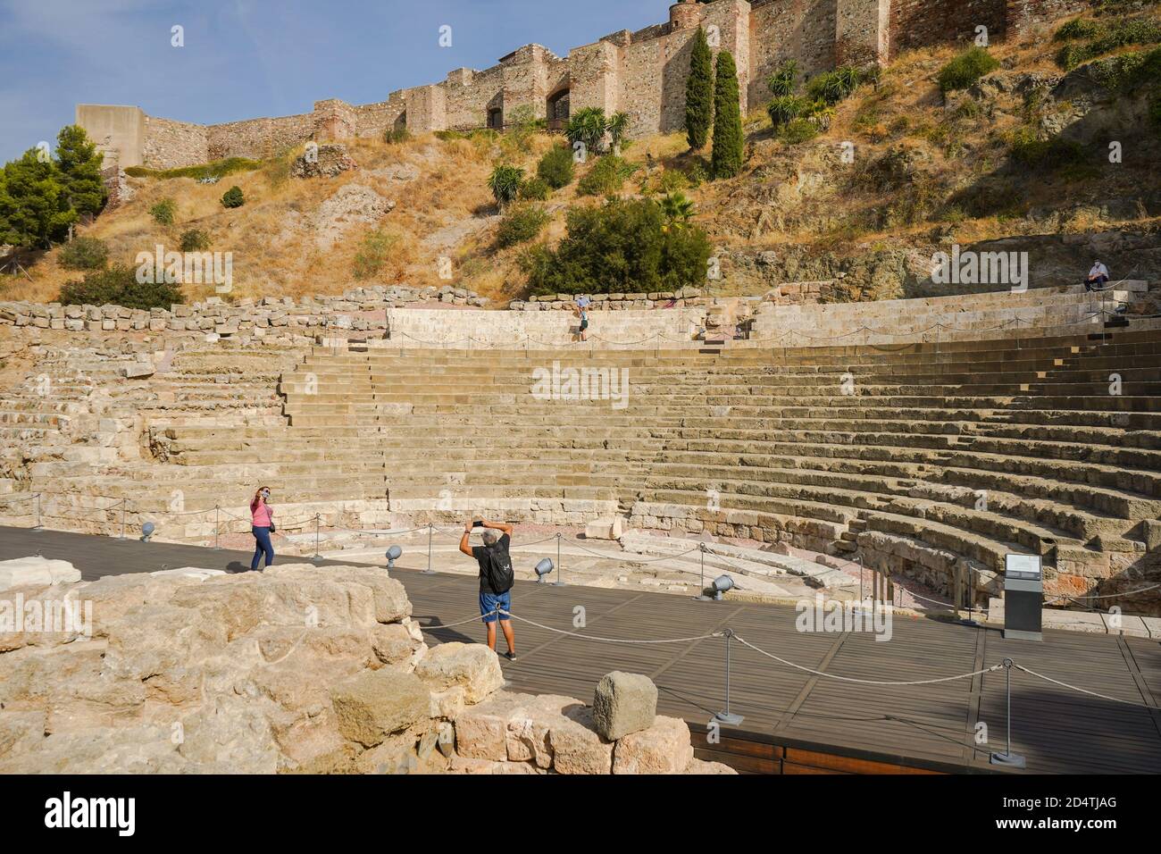 Malaga Spain. Malaga Alcazaba. Ancient Roman amphitheater with Alcazaba behind, Malaga, Andalusia, Spain Stock Photo
