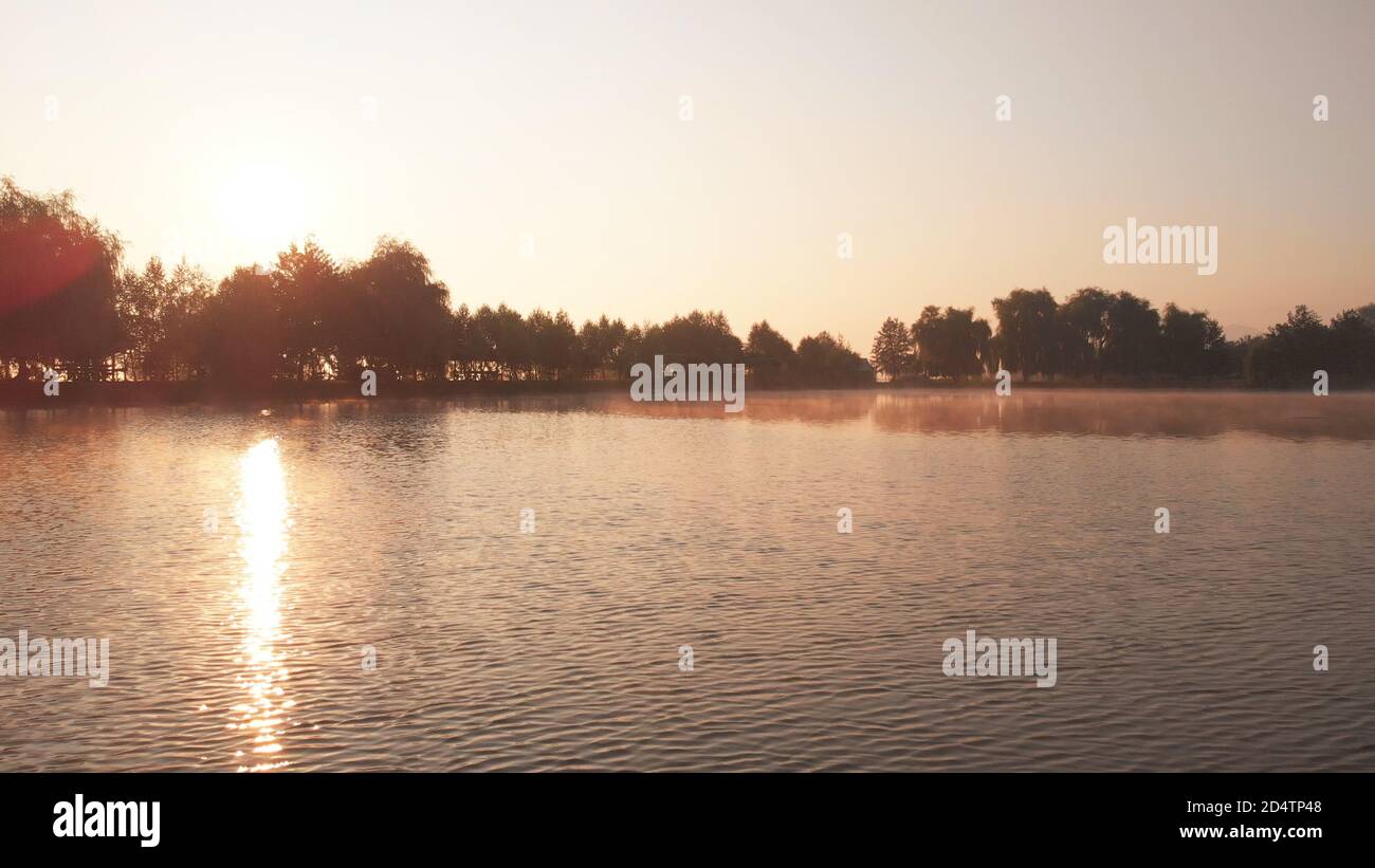 Sun glare on the surface of water Stock Photo - Alamy