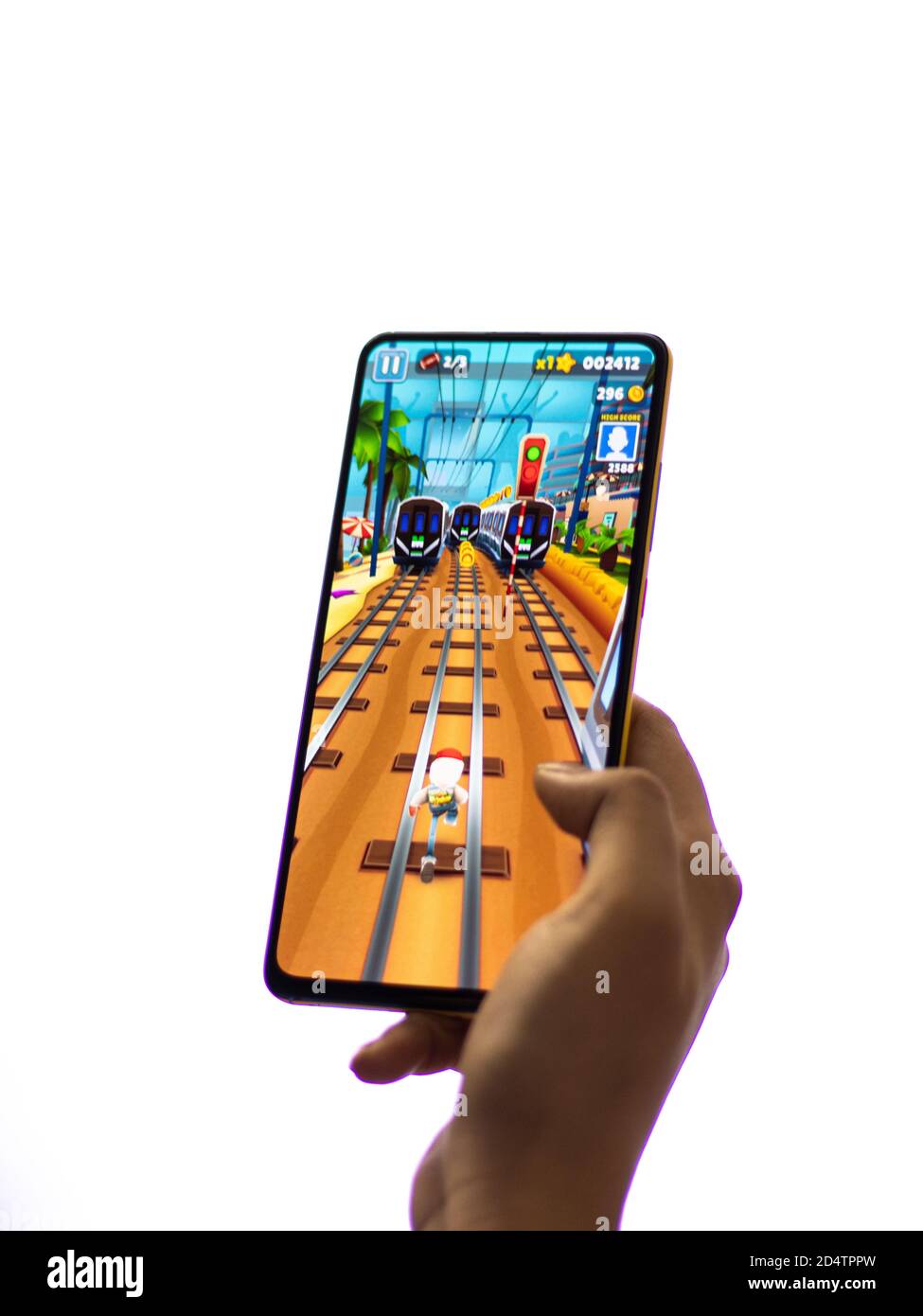 LVIV, UKRAINE - November 08, 2022 : Playing mobile game Subway Surfers on  modern smartphone. Stock Photo